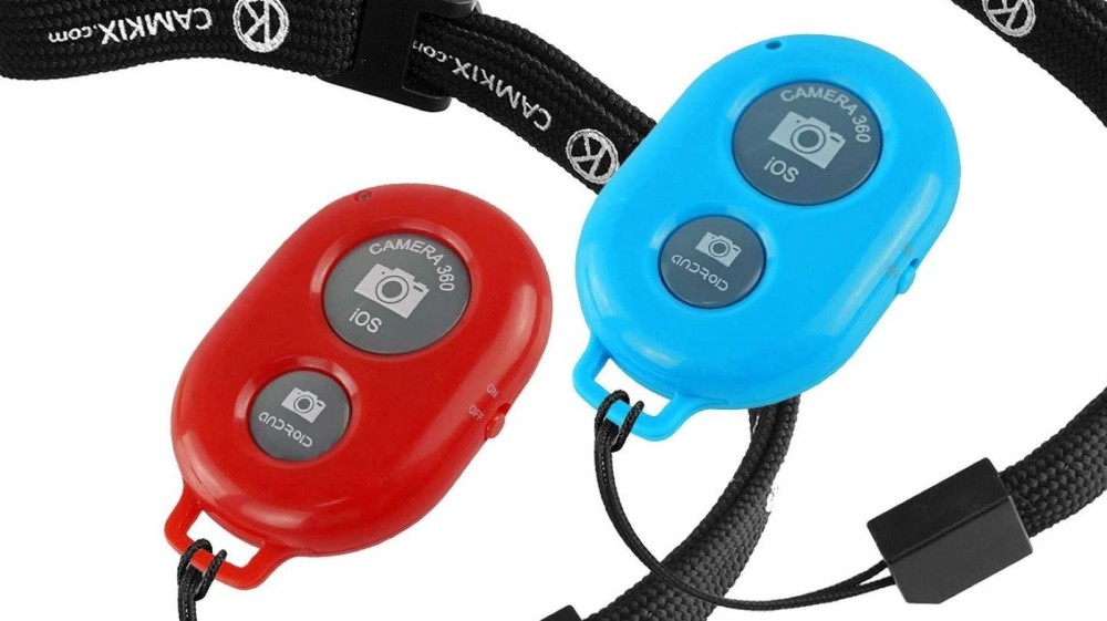 Two CamKix Camera Shutter Remote Controls in red and blue.