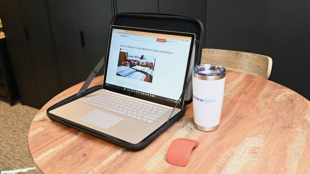 An opened Pelican Adventurer Laptop Sleeve with a laptop inside.